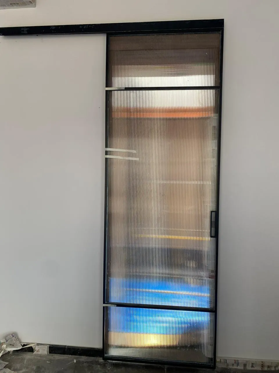 Minimal frameless shower glass pane — profile-less look